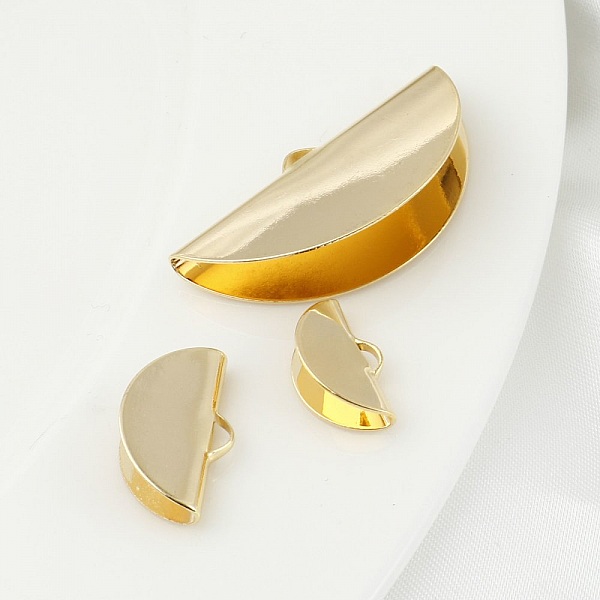 2 forgyldte halvm&aring;ne-krimps 15 x 09 mm