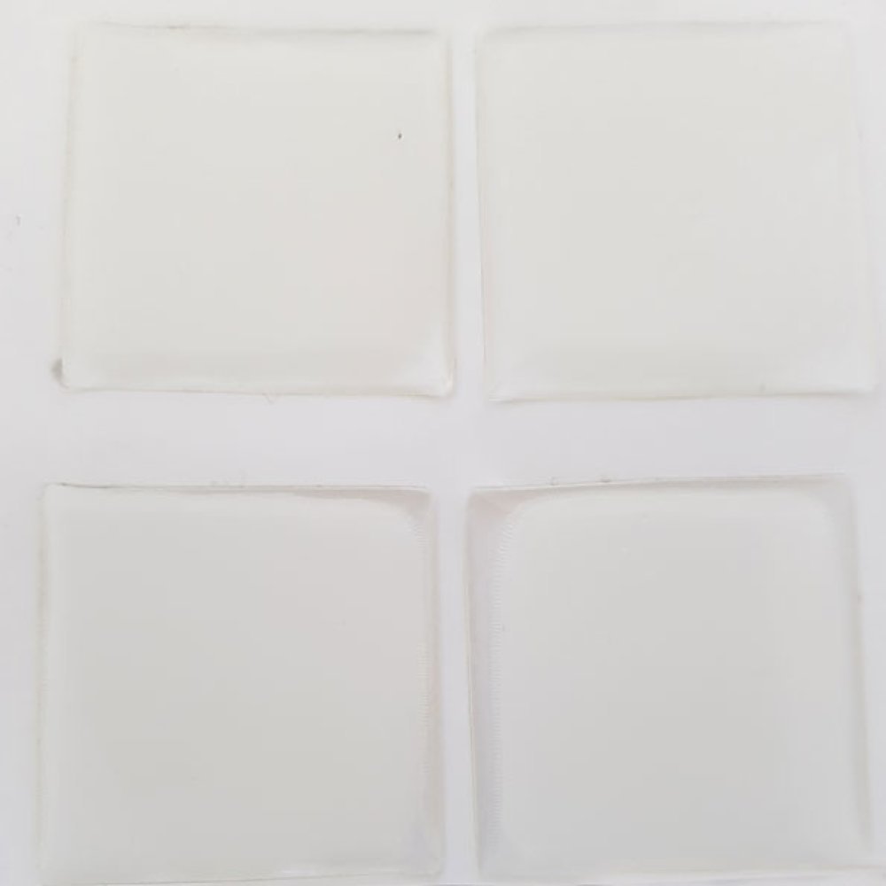 9 selvklæbende cabochons i harpiks 20 x 20 mm gennemsigtig