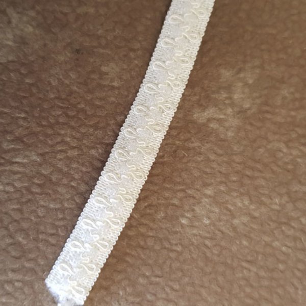 I meterm&aring;l Fancy hvid elastik 10 mm.