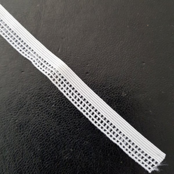 I meterm&aring;l Fancy hvid elastik 12 mm.