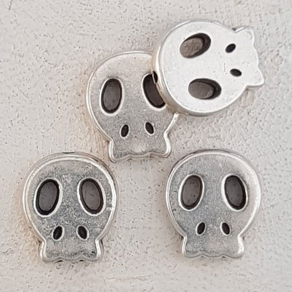 Kranie og korslagte knogler charme N&deg;11