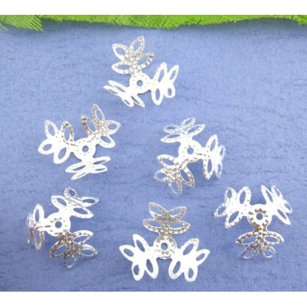 S&oslash;lvblomst med vandm&aelig;rke i legeringssk&aring;l med s&oslash;lvbel&aelig;gning x 300