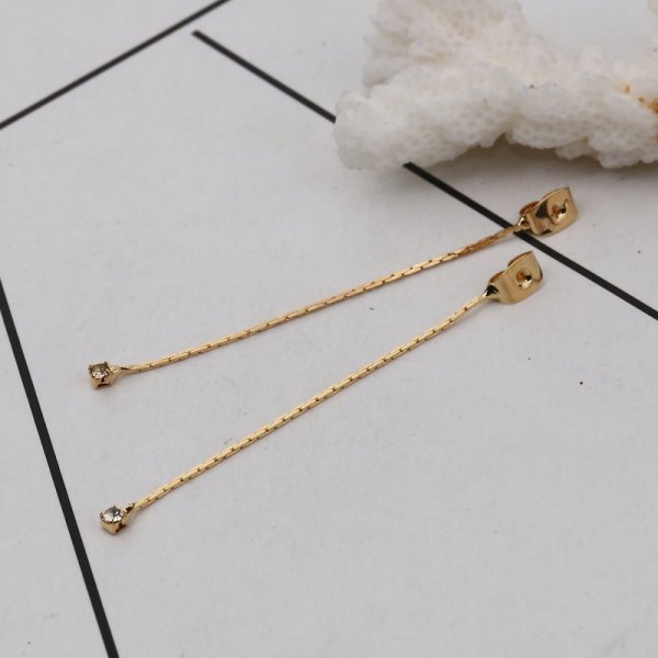 &AElig;gte forgyldt kobber &oslash;reringe med en slutkappe N&deg;01 med gennemsigtig strass