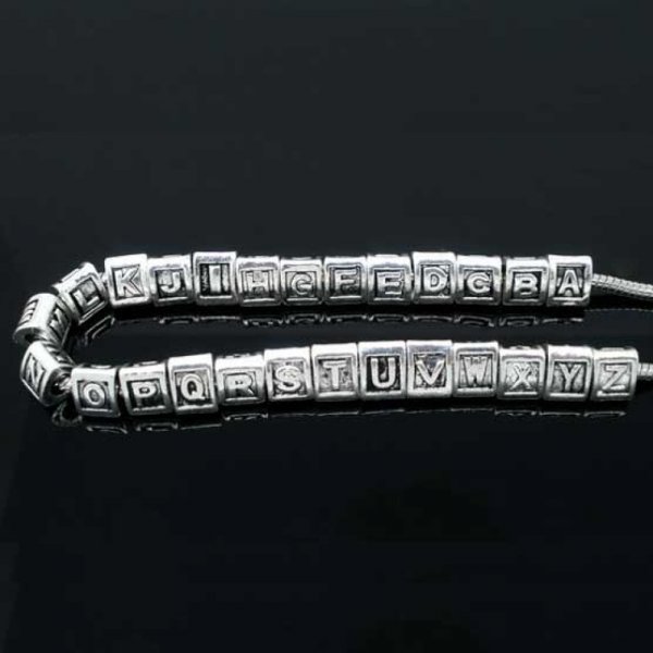 Perle triangle charms alphabet N&deg;02 lettre T m&eacute;tal argent&eacute; 8x9 mm