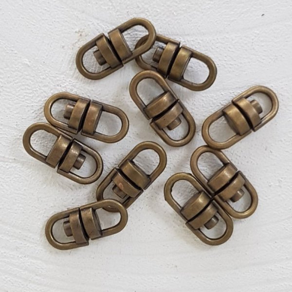 N&oslash;gleringe med drejefunktion Bronze