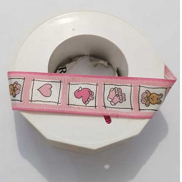 Ruban galon 25 mm avec motifs enfant roses sur bobine.