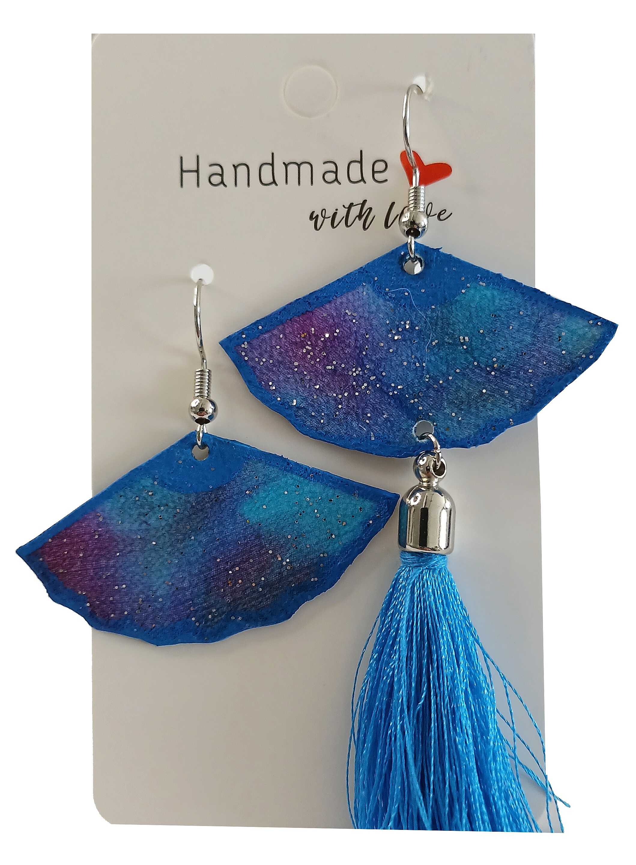 Boucles d oreilles en soie recto verso avec pompon.