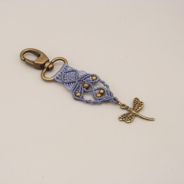 Taskejuvel med karabinern&oslash;glering til personlig tilpasning