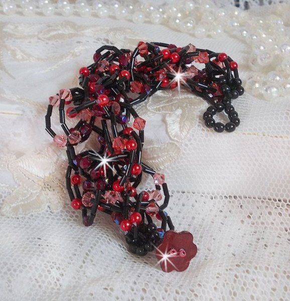 Feeling armb&aring;nd med r&oslash;rperler, perlemorsperler og Swarovski krystal snurrende toppe