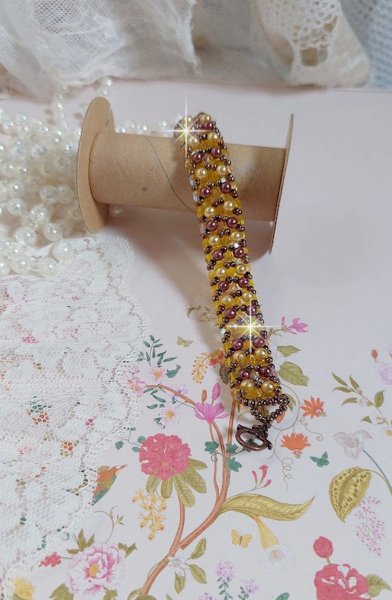 Soleil perlearmb&aring;nd med glasperler og facetter