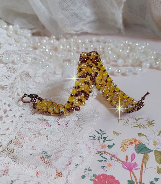 Soleil perlearmb&aring;nd med glasperler og facetter