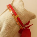Rouget duo-armbånd i læder med guldglitter og Gingko-design  