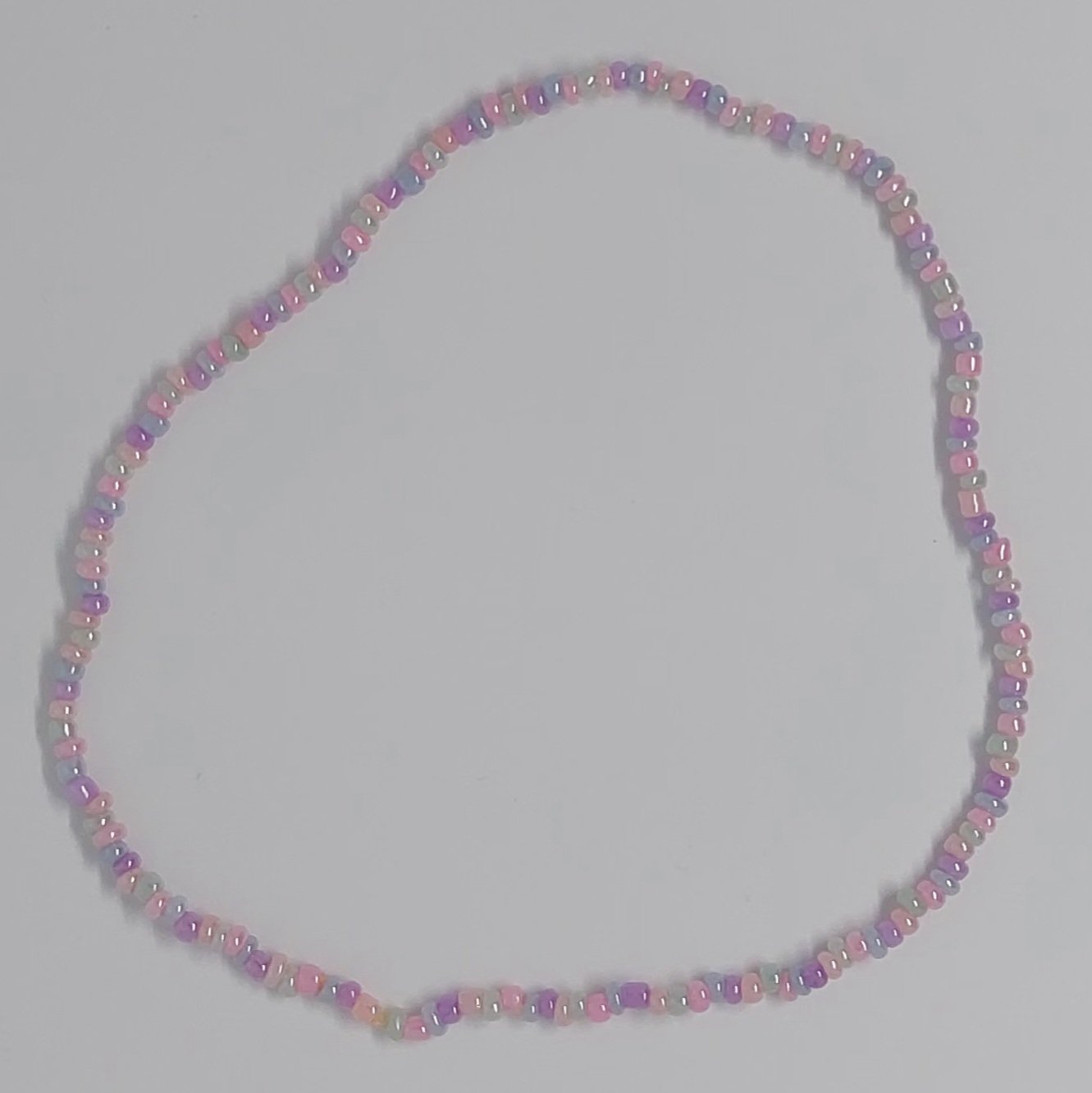 Ras du cou sir&egrave;ne en perles pastel