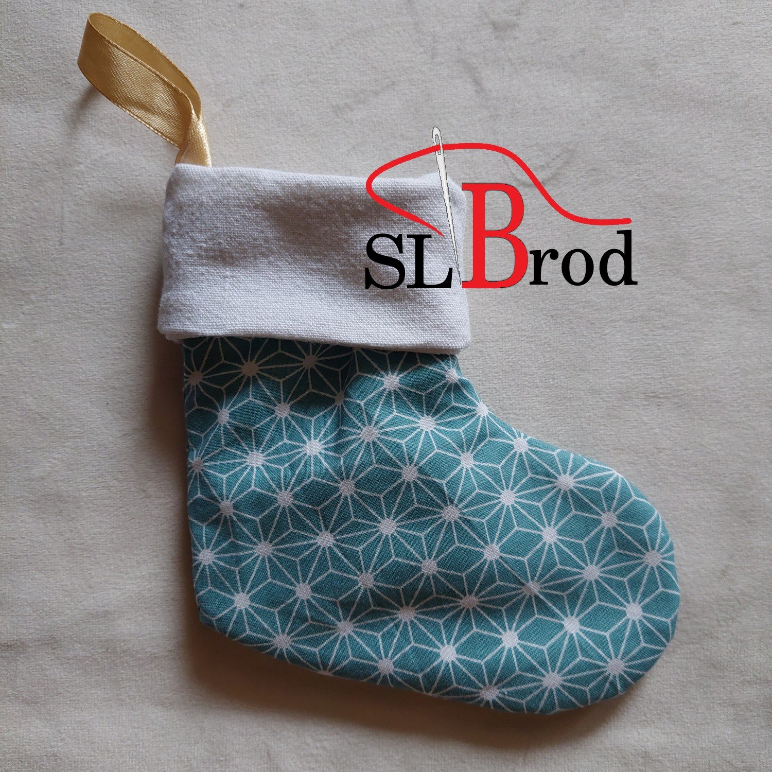 Petite chaussette de Noël tissu turquoise à motif